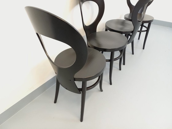 Image 1 of Set van 4 vintage Baumann Mouette stoelen in zwart hout uit de jaren 70.