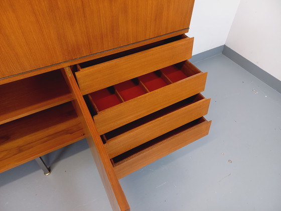 Image 1 of Louis Paolozzi's vintage modernist secretary bookcase for Monopoly in teak and metal from the 60s