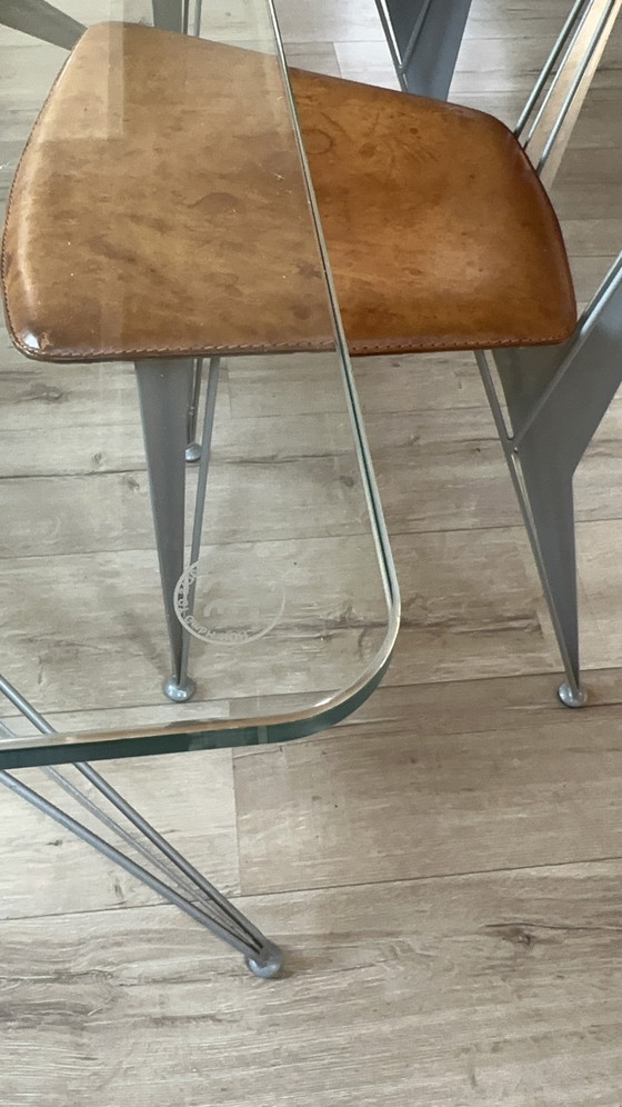 Image 1 of Table de salle à manger design avec 4 chaises en cuir assorties