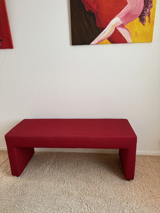 Red elongated design bench