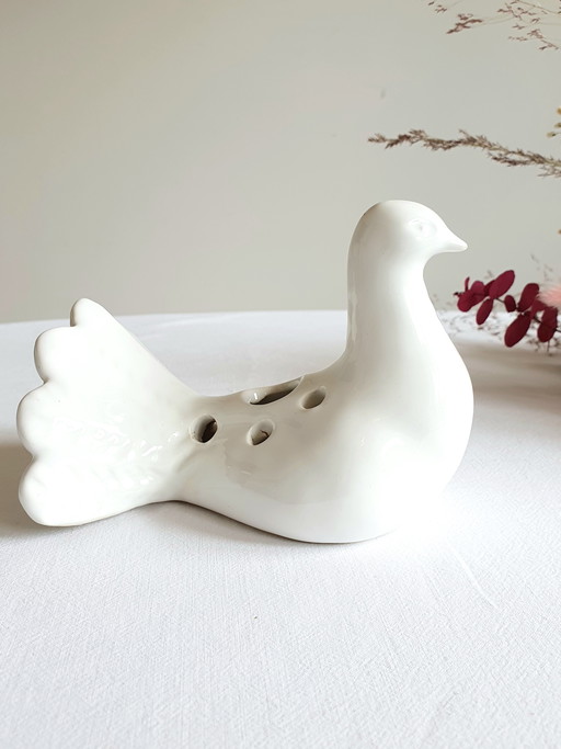 Rana da fiore vintage a forma di colomba