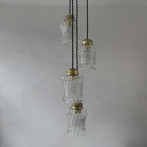 ANTIQUE 4-LIGHT CASCADE CHANDELIER