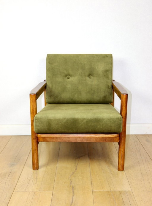 Wooden armchair designed by Z. Baczyk in a vintage style, upholstered in olive green velvet.