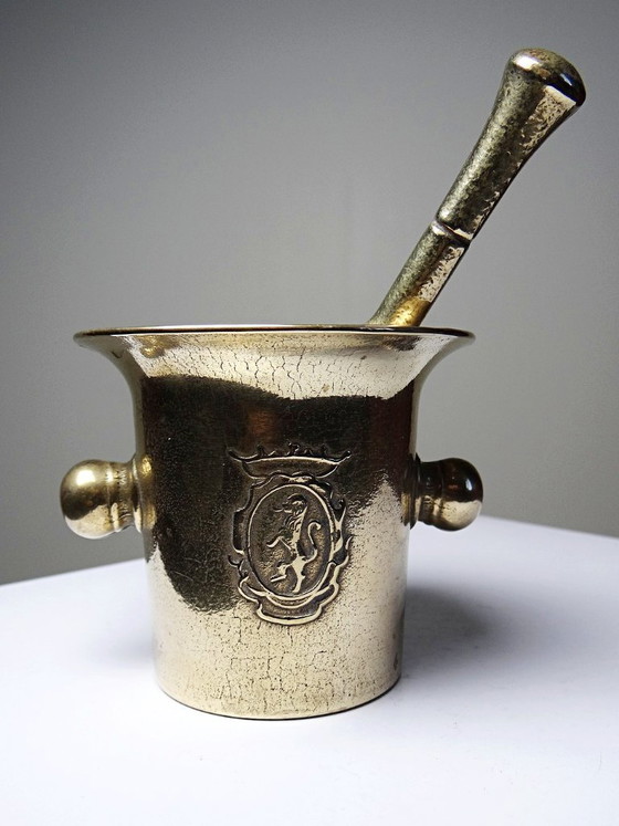 Image 1 of Gilt bronze apothecary's mortar and pestle with heraldic decoration, 20th century