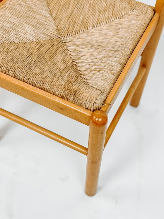 Image 1 of 2x houten Scandinavische eetkamerstoelen met biezen zitting