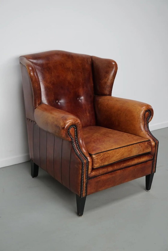 Image 1 of Vintage Nederlandse clubfauteuil in cognackleurig leer