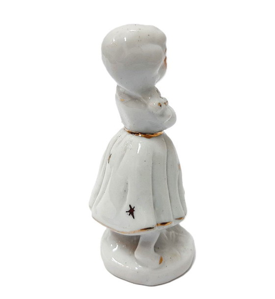 Image 1 of Statuetta in porcellana d'epoca raffigurante una ragazza che suona musica