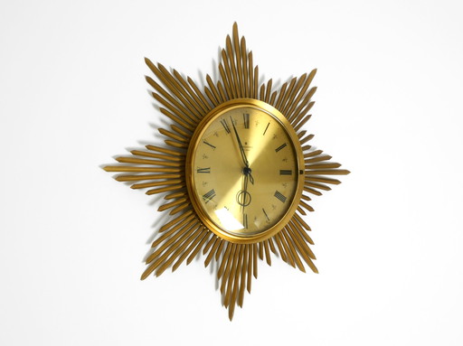 Prachtige grote originele messing zonnestraal wandklok uit 1960 van Junghans ATO-MAT