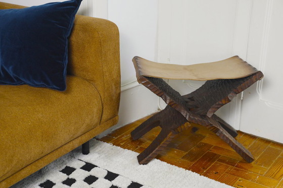 Image 1 of Brutalist Folding Stool Leather Sling Seat Hand Carved Wood X Frame 1950s Rustic Mid Century Ottoman