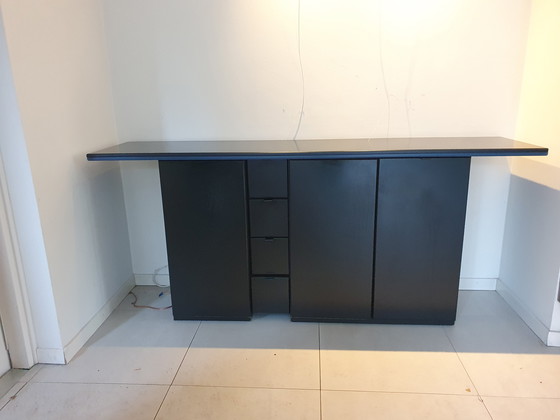 Image 1 of Uniek ontwerp zwarte Pastoe dressoirkast, met blauw accent