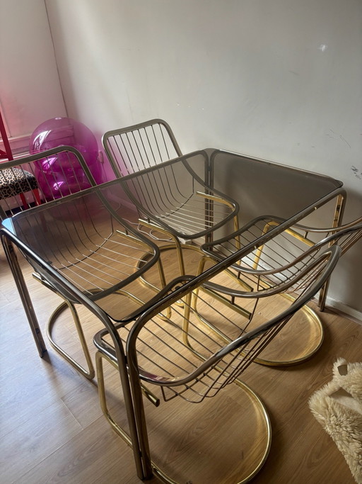 Vintage eethoek rookglas tafel 4 stoelen
RIMAGastone Rinaldi