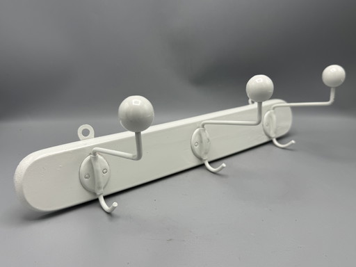 Mid - Century coat rack sleek and timeless design