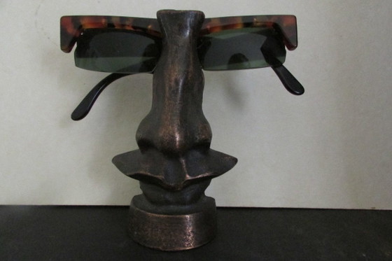 Escultura de una nariz, metal marrón, Bronce (foto 6 de 8)