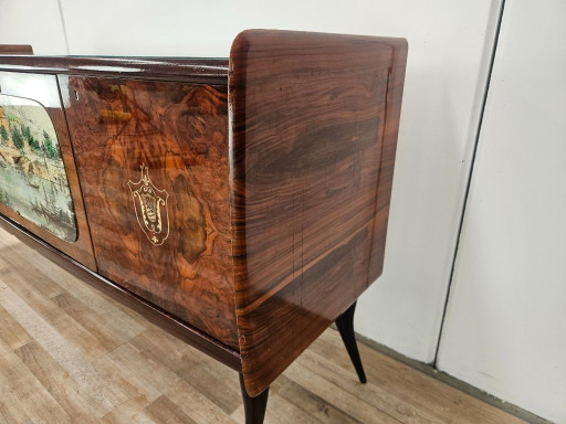 Mid-century mahogany sideboard from the 1950s with aqua green glass and a central bar compartment
