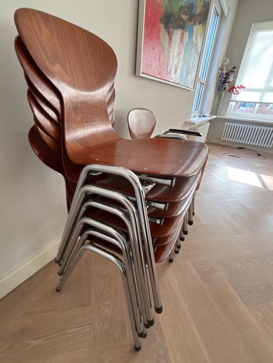 Image 1 of 7 chaises empilables au design industriel Eromes Pagholz