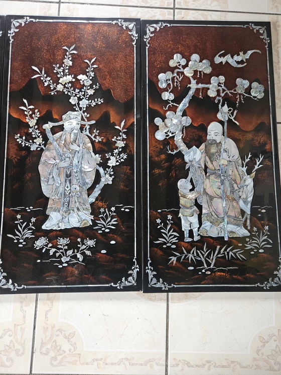 Image 1 of Set of four handcrafted panels in brown lacquer and mother-of-pearl, origin Vietnam, circa 1970