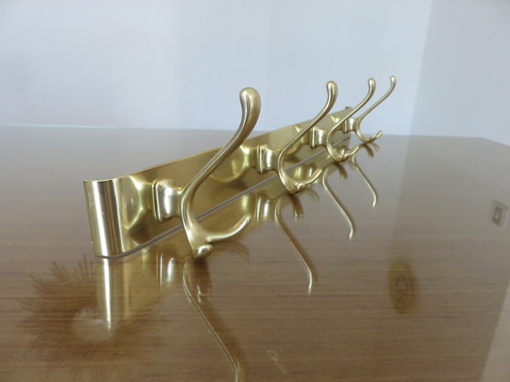 Image 1 of Large wall-mounted coat rack in gilded aluminum, France, 1970