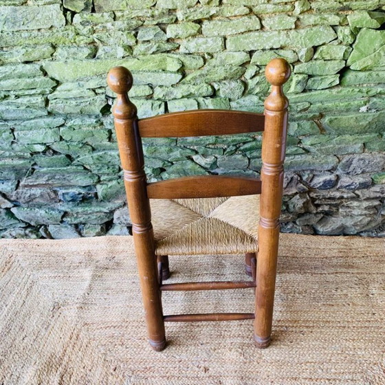 Image 1 of Set van 4 massief houten stoelen met rieten zittingen