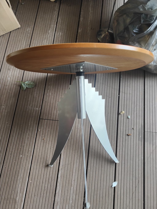 Design side table with rotating top metal base
