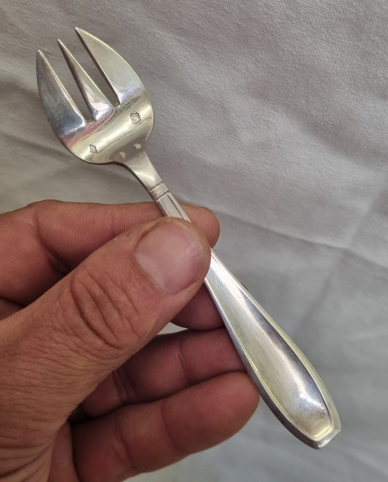 Image 1 of 4 fourchettes à huîtres argent massif minerve