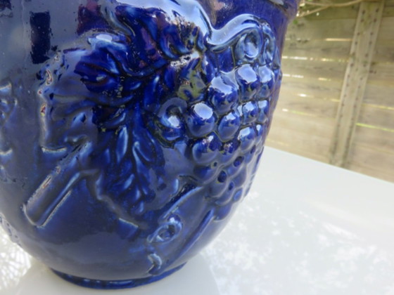 Image 1 of Wall-mounted flower pot, grape motif, in blue glazed ceramic, 1970s