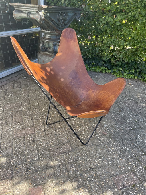 Jaren 60 vlinderstoel met tuiglederen zitting