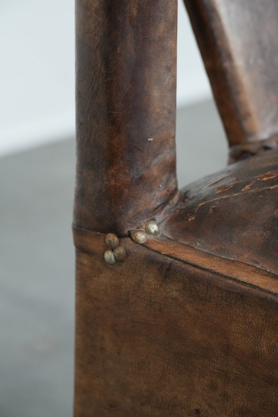Image 1 of Unieke antieke schapenleren stoel/ armchair met een bijzonder Noord-Afrikaans design