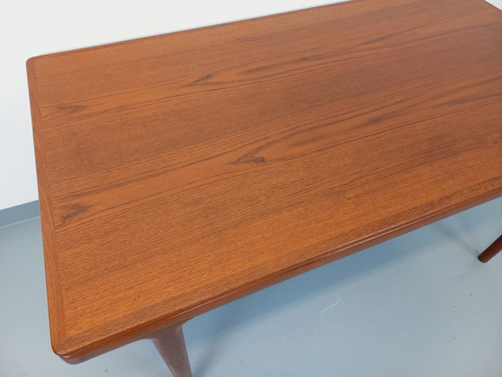 Image 1 of Scandinavian rectangular vintage dining table by Johannes Andersen for Samcom from the 60s in teak with integrated extensions
