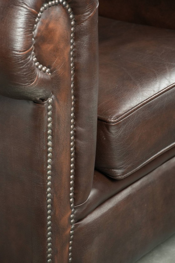 Luxury brown cowhide leather set consisting of a smooth Chesterfield sofa and armchair – 3-5 seaters (photo 25 of 26)