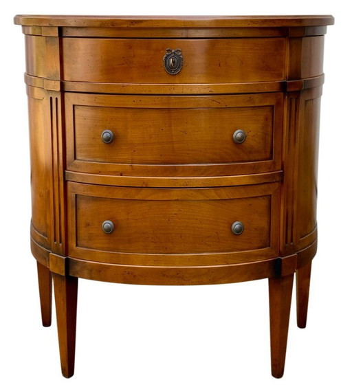 Louis XVI style cherrywood three-drawer half-moon commode