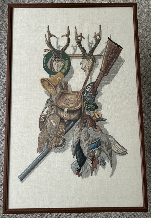 Met glas ingelijst borduurwerk met jachttafereel