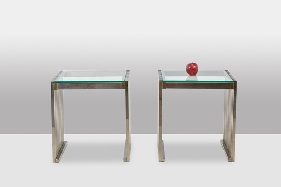 Image 1 of Coppia di tavolini o comodini in metallo cromato. Anni '70.