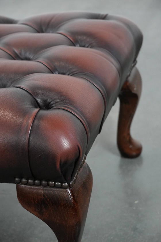 Image 1 of Dark brown Chesterfield footstool made of cowhide