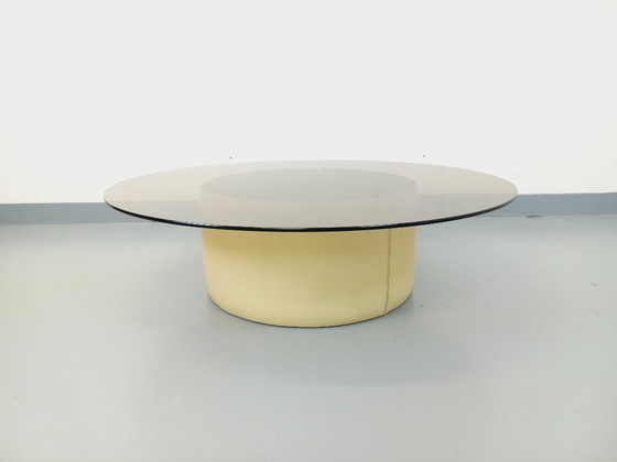Image 1 of Vintage ronde salontafel van glas, leer en metaal, in Space Age-stijl uit de jaren 70.
