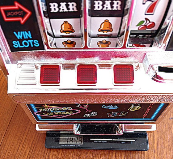 Image 1 of Gokautomaat of gokkaart, spaarvarken