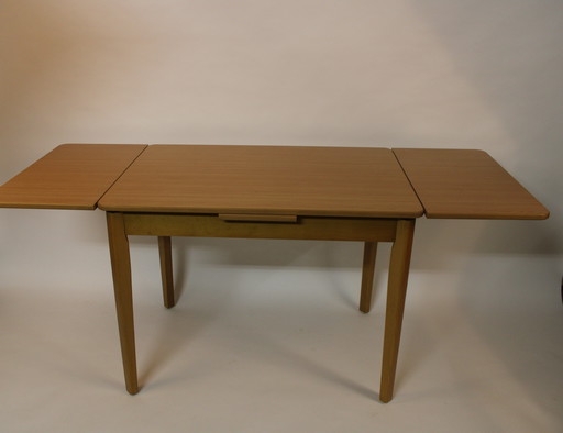 Vintage extendable wooden dining table