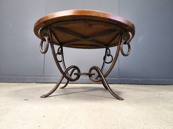 Image 1 of Smeedijzeren salontafel van René Drouet, jaren 1940.