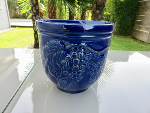 Wall-mounted flower pot with grape motif in glazed blue ceramic, 1970s