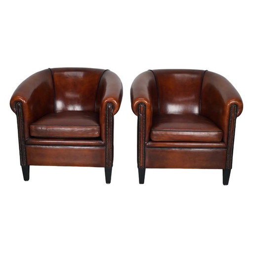 Sillones de club holandeses vintage en cuero color coñac, juego de 2