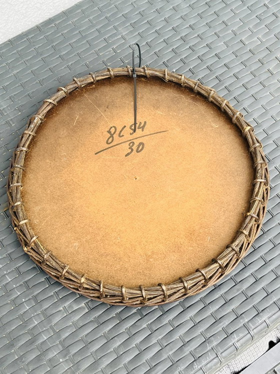 Image 1 of Miroir soleil vintage en osier tressé