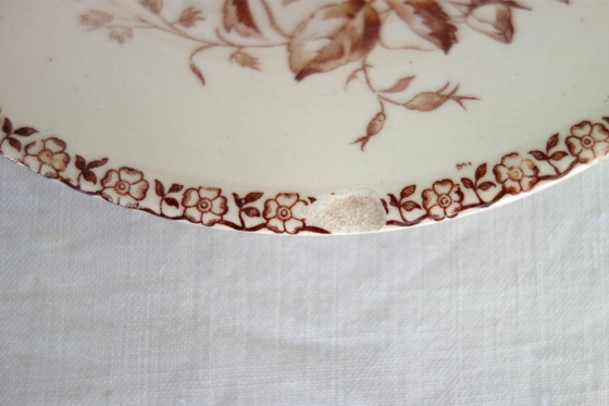 Image 1 of 11 assiettes plates Terre De Fer Gien modèle Mai vers 1900