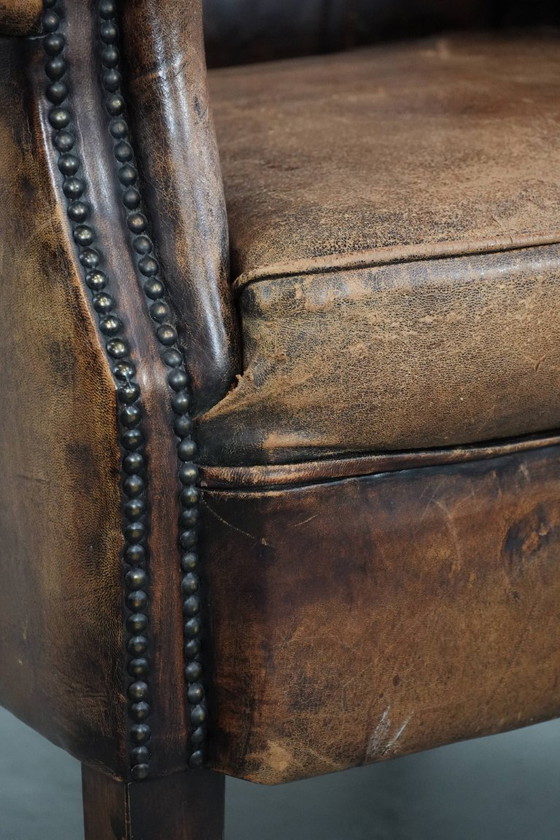 Image 1 of Unique large English-style sheepskin Chesterfield wing armchair