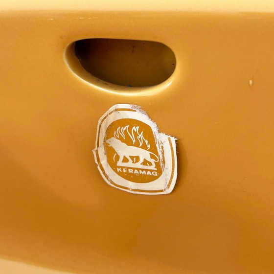 Image 1 of Vintage mosterdkleurige wastafel (M) van Keramag Keravit, jaren 80.