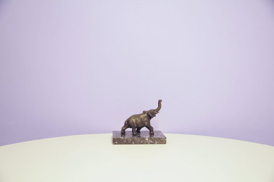 Image 1 of Buchstütze Elefant aus schwarzem Marmor