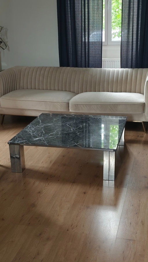Black marble and chrome coffee table