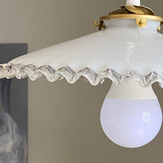 Image 1 of Antique pendant light with a white opaline glass shade and a transparent wavy edge
