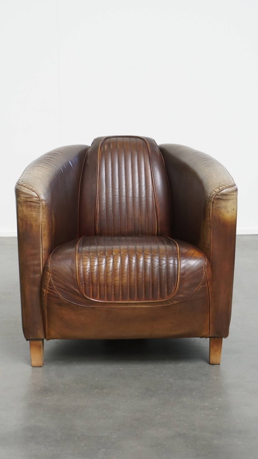 Fauteuil design aviateur en cuir de bœuf avec une palette de couleurs unique