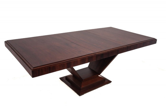 Image 1 of  zoom_in Original walnut extendable table, designed by Louis Majorelle, with 6 Art Deco chairs.