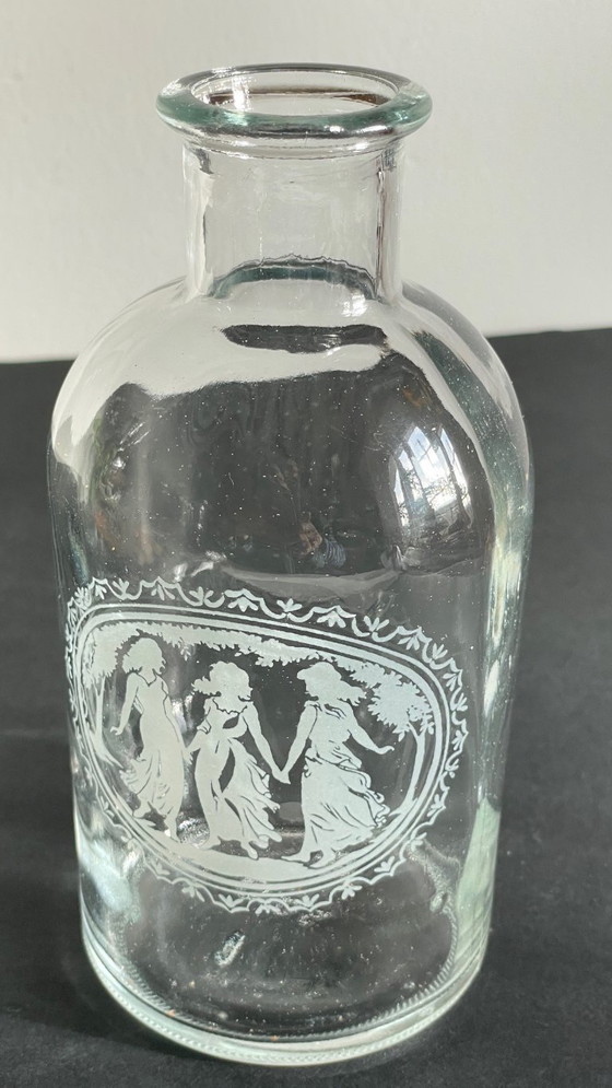 Image 1 of Vintage Engraved Glass and Wood Bottles
