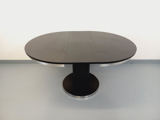 Image 1 of Table ronde de repas vintage en mélaminé esprit bois noir et métal chromé style Space Age / Diner des années 70 avec rallonge in